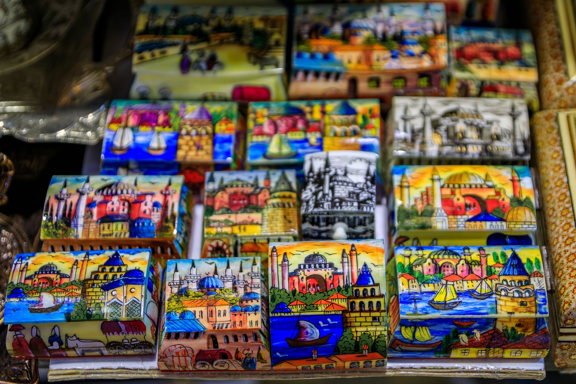 Colorful souvenir boxes with city landmarks in Grand Bazaar, Istanbul, Turkey